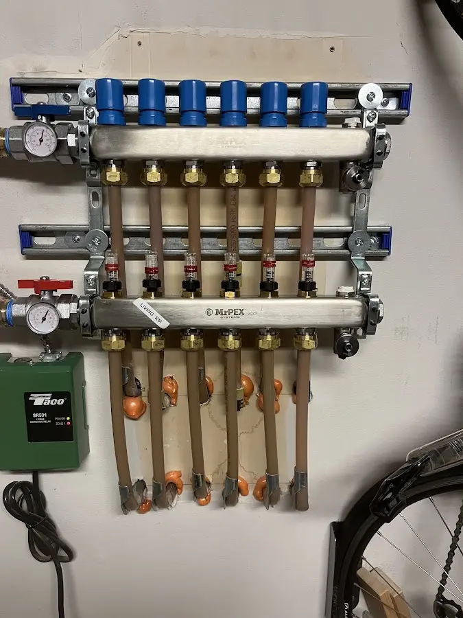 Plumber performing Water Heater Repair at a residential property in Paradise Valley